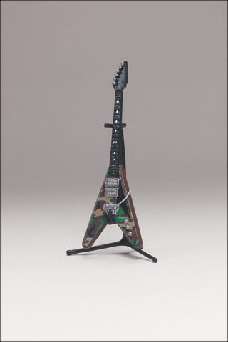 Illustration for article titled McFarlane's Tiny, Plastic Guitar Hero Guitars